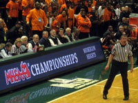 FBOA member Bruce Arter officiates a 2010 Class B Boys Semi-Final basketball game.