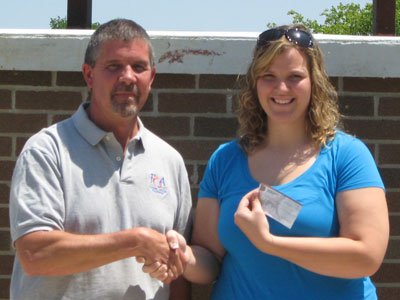 Kristen Fitzsimmons receives her Scholarship Award check from FOA President Bruce Arter