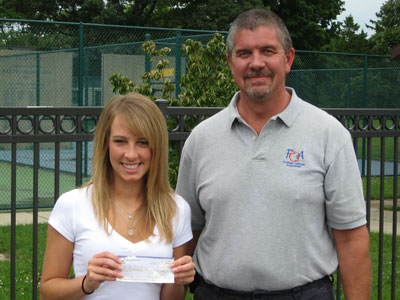 Leigh Ann Ives receives her Scholarship Award check from FOA President Bruce Arter